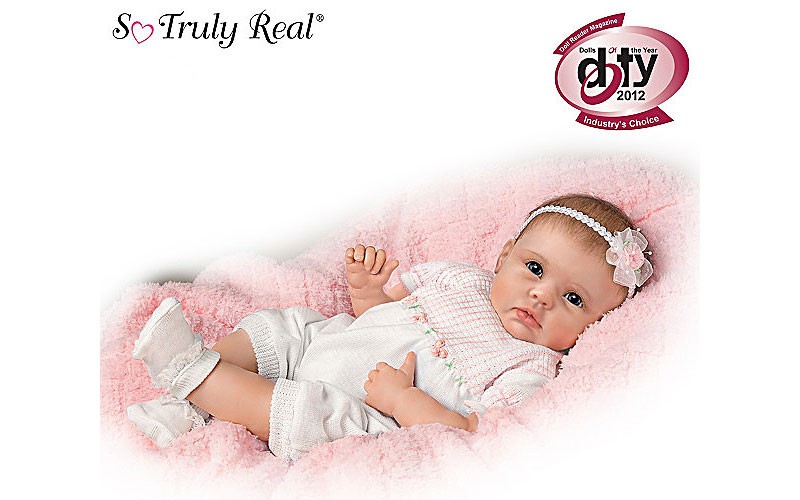 Lifelike Interactive Baby Doll Really Holds Your Hand