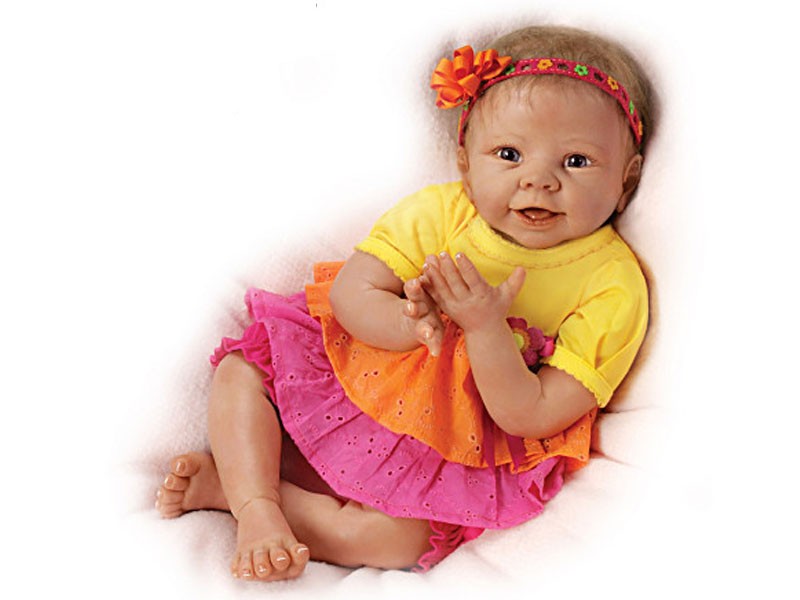 Lifelike Interactive Baby Doll Giggles At Your Touch