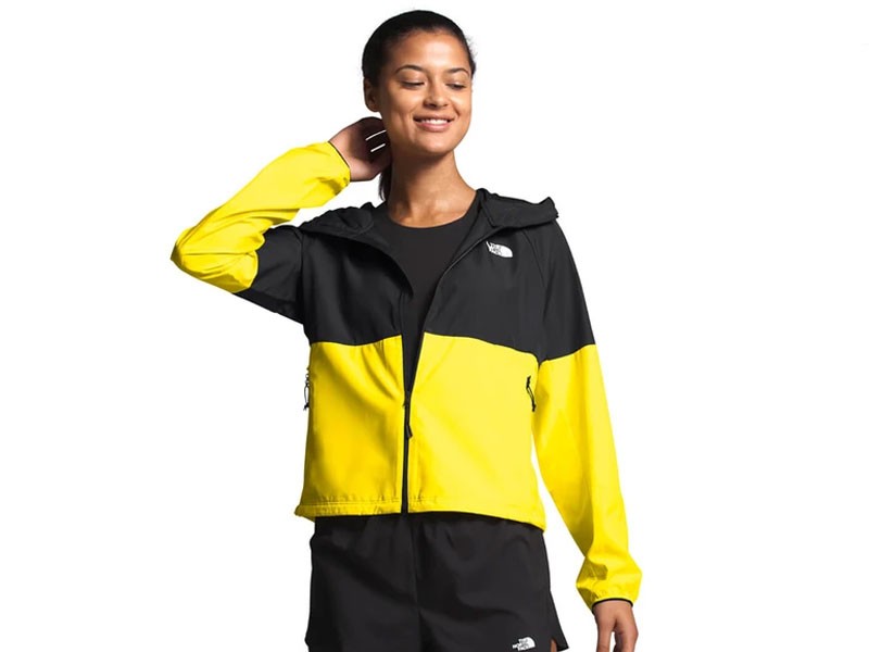 The North Face Women's Flyweight Hoodie in TNF Lemon and TNF Black