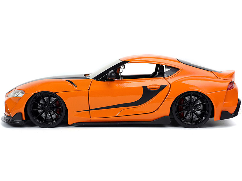 Toyota Supra Orange with Black Stripes Diecast Model Car By Jada