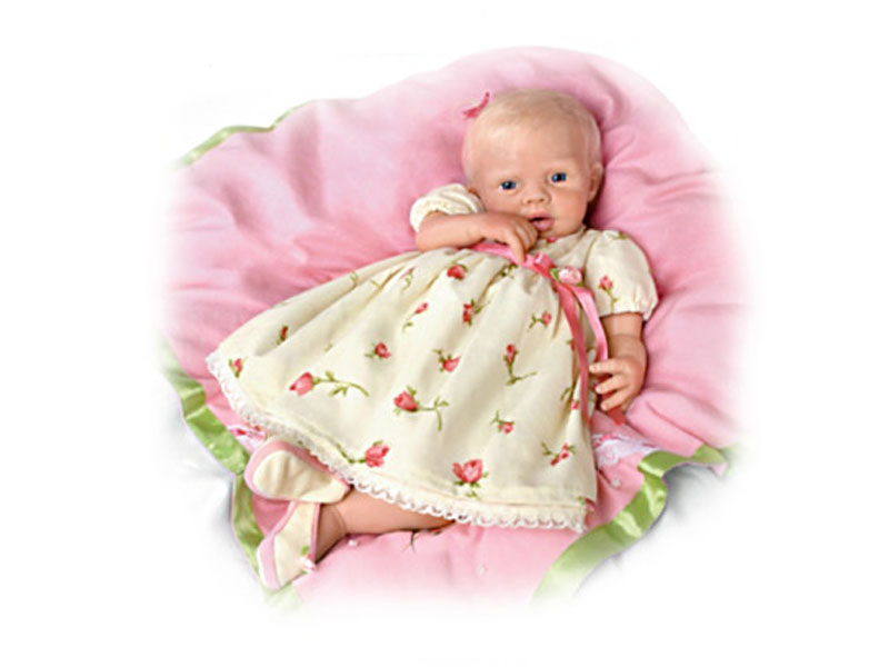 Lily Rose Silicone Baby Doll With 7-Piece Layette Set